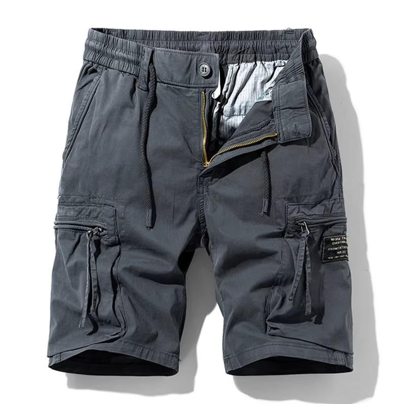 Men's lightweight cotton cargo shorts in neutral tone, straight-cut silhouette with six snap-closure pockets