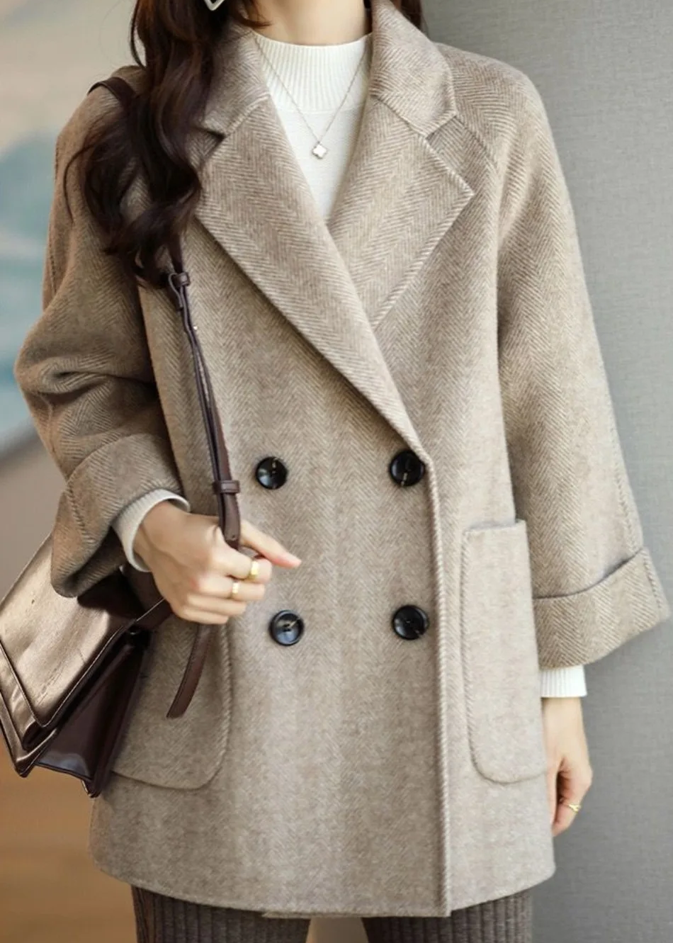 Beige oversized double-breasted trench coat with bold statement buttons, Korean-inspired silhouette