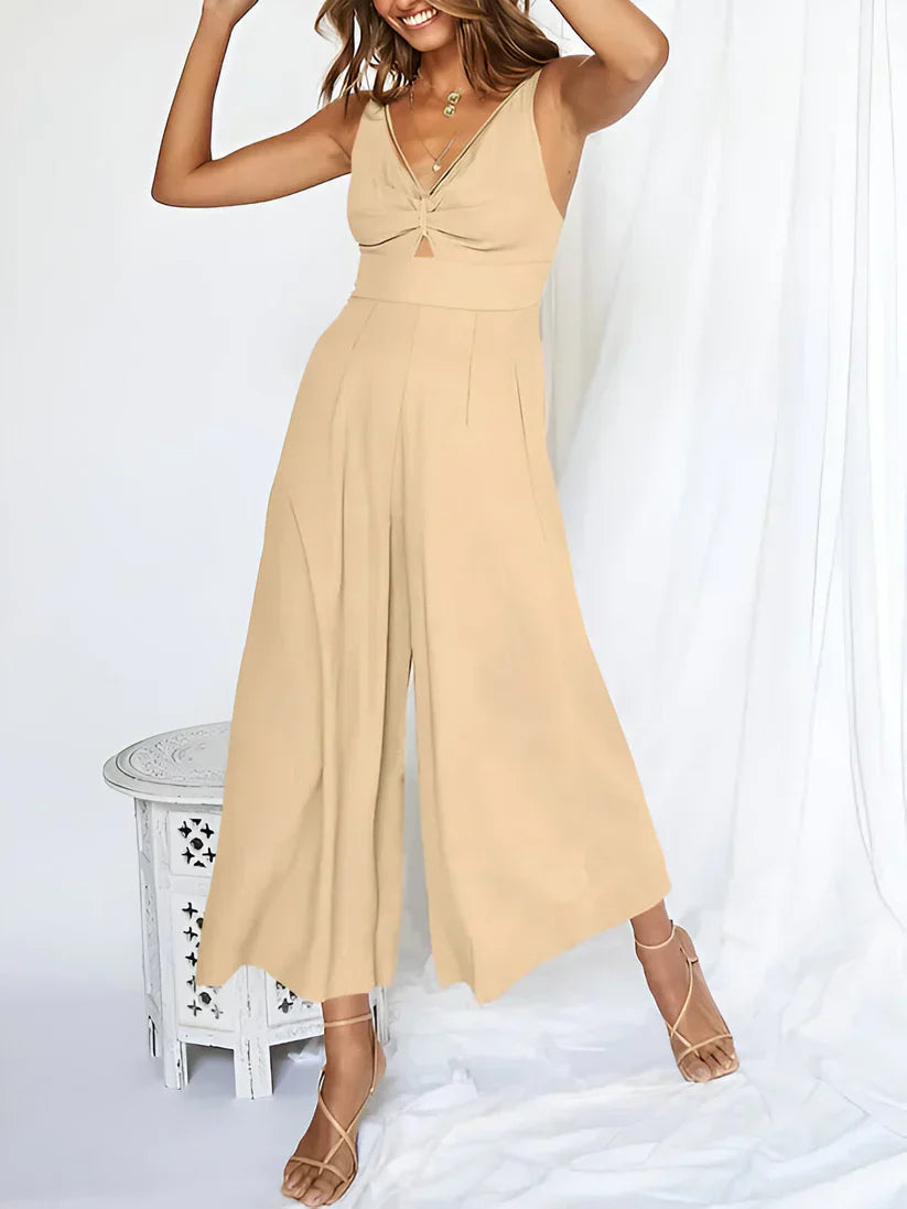 Navy blue sleeveless V-neck jumpsuit high waist wide leg silhouette women's fashion