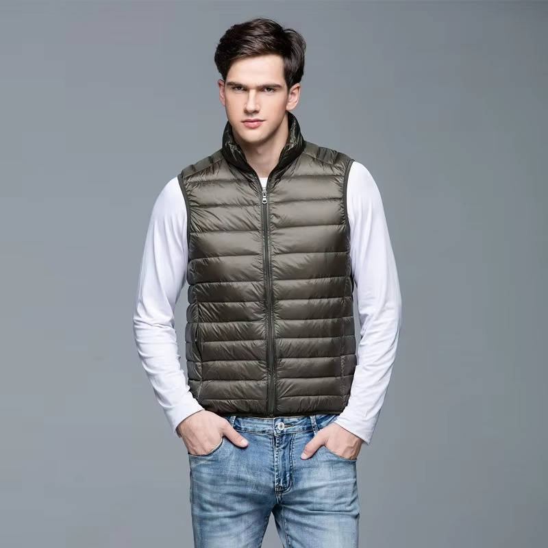 Men's navy blue lightweight packable down vest slim fit with zip pockets for travel warmth