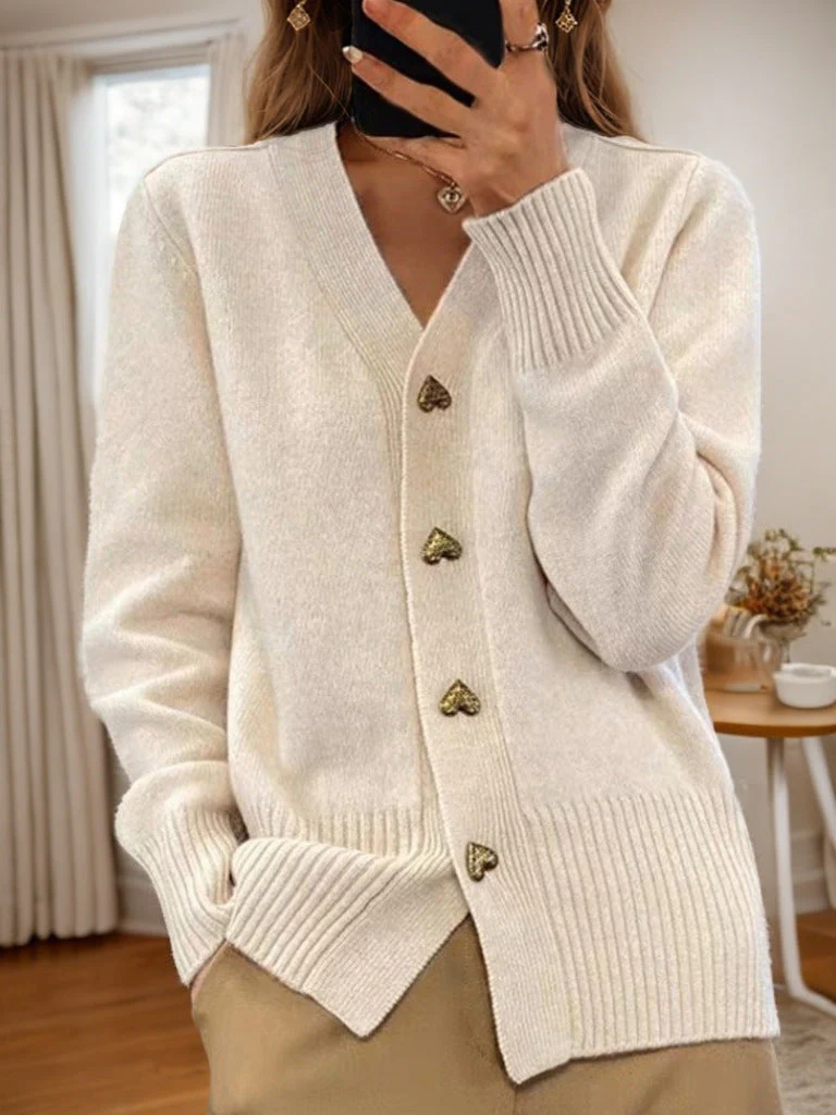 Women's soft wool blend cardigan in cozy fit with V-neck and heart-shaped button detail