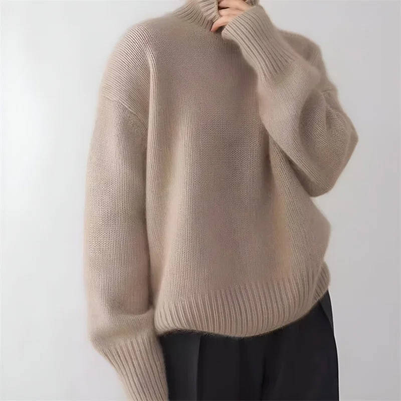Women's oversized cashmere turtleneck sweater soft lightweight relaxed silhouette everyday luxury