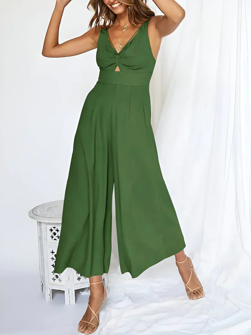 Navy blue sleeveless wide-leg jumpsuit with V-neck and high-waist silhouette for women