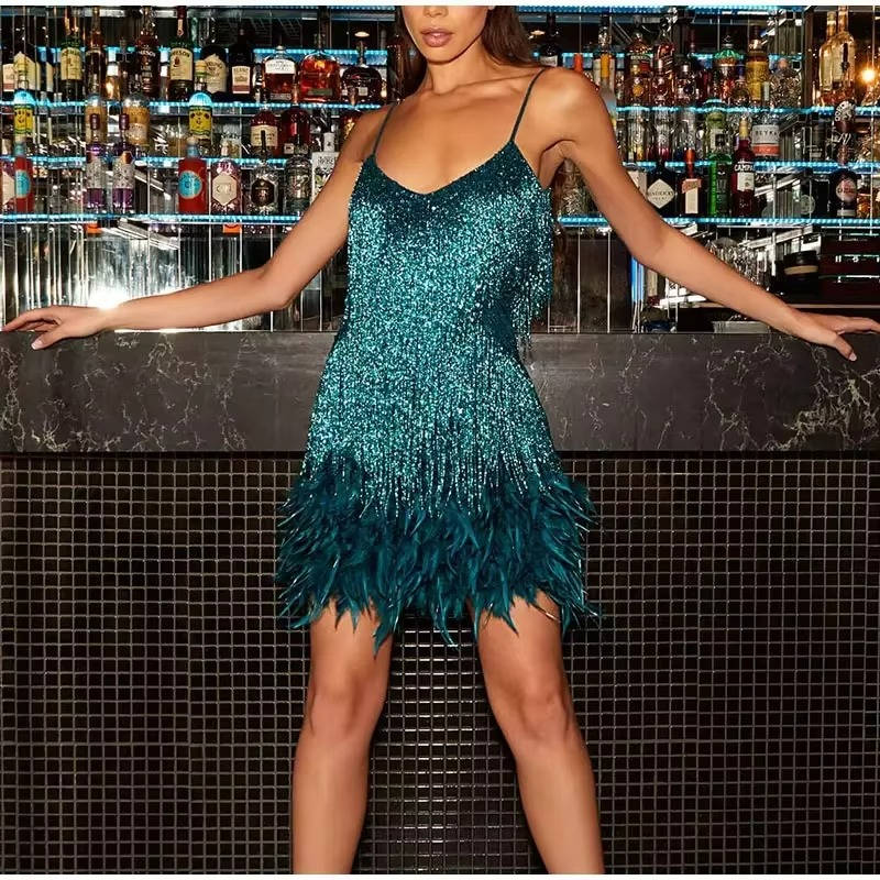 White sleeveless mini cocktail dress with fringe body and feather hem, body-conscious fit