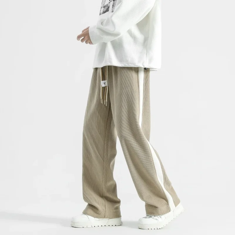 Corduroy wide-leg trousers with elastic drawstring waist and contrast side stripes for streetwear