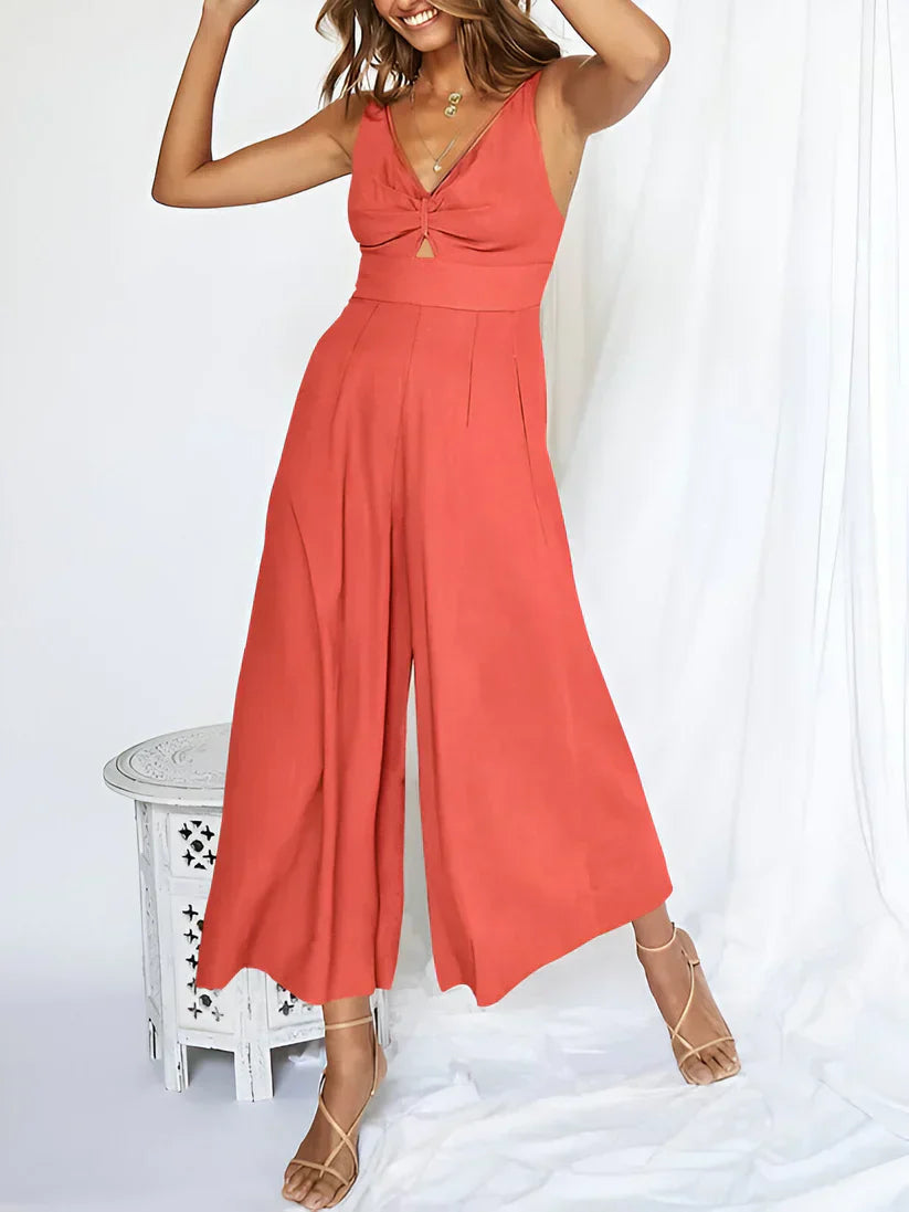 Navy blue sleeveless V-neck jumpsuit high waist wide leg silhouette women's fashion