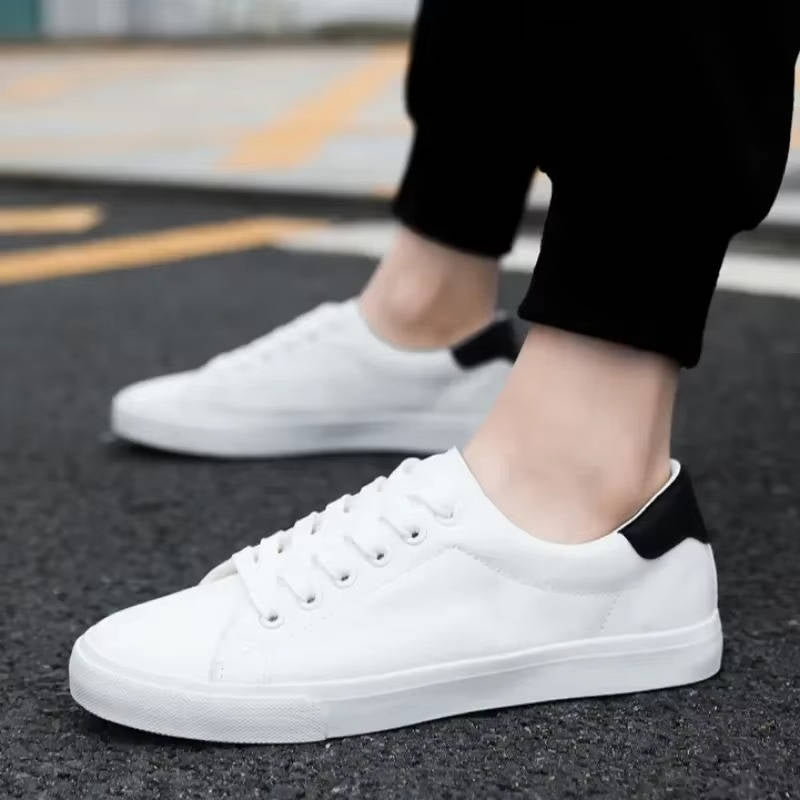 White premium PU leather low-top sneaker with reinforced stitching for polished urban everyday style