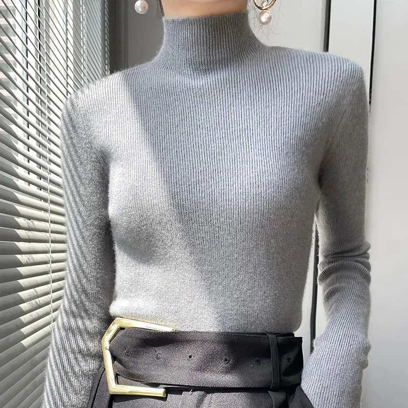 Women's slim fit wool blend turtleneck pullover sweater with ribbed edges in cozy knit