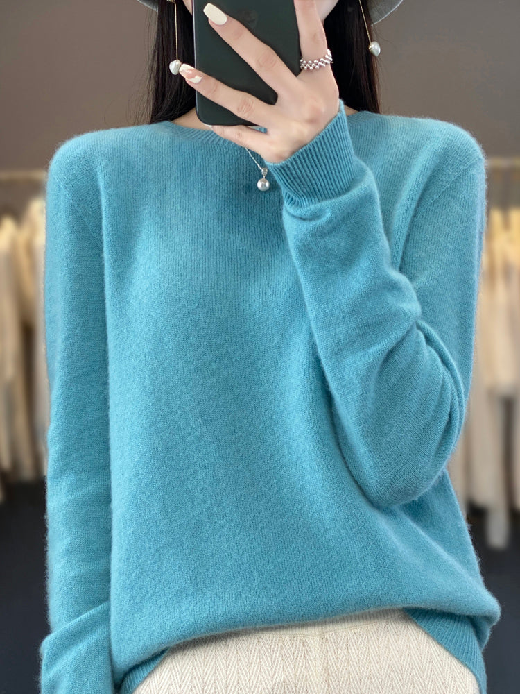 Women's classic crewneck winter sweater in timeless silhouette, versatile everyday knit with clean neckline