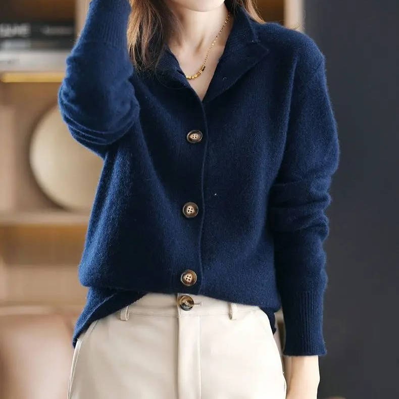 Women's beige knit sweater with oversized statement buttons, relaxed fit, soft cotton-blend fabric
