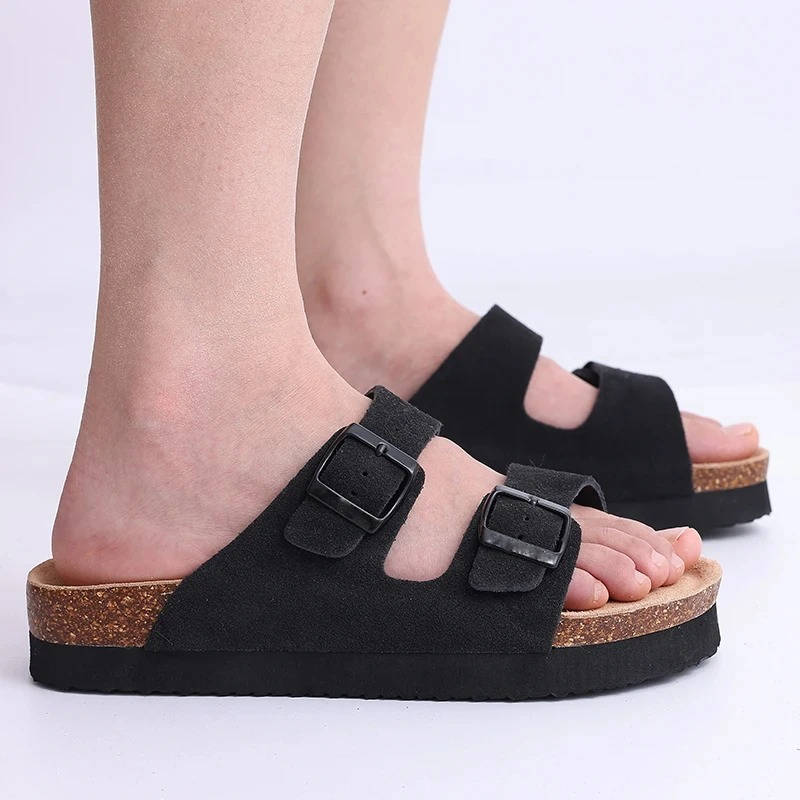 Neutral cork footbed sandals with double buckle straps, ergonomic arch support, unisex casual style