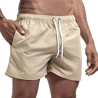 Men's gray quick-dry swim trunks with drawstring waist, comfort fit beach shorts for active wear