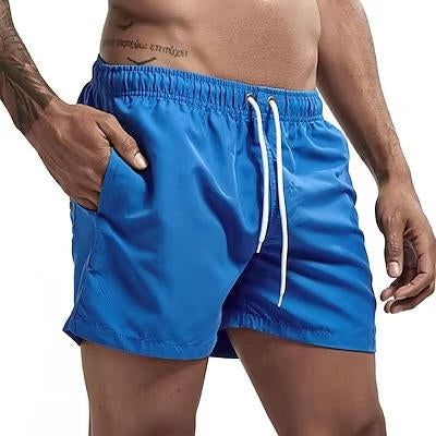 Men's gray quick-dry swim trunks with drawstring waist, comfort fit design for beach and active use