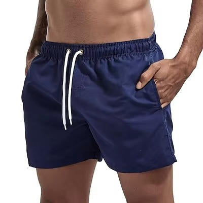 Men's gray quick-dry swim trunks with drawstring waist, comfort fit design built for beach and active use