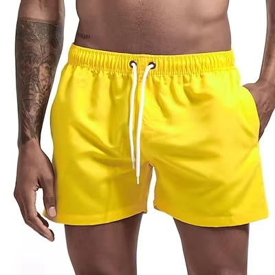 Men's gray quick-dry swim trunks with drawstring waist, comfort fit design for beach and active use