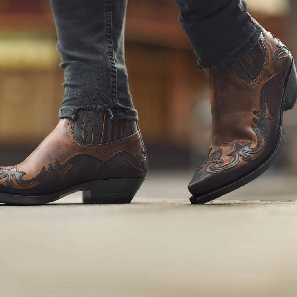 Women's Western ankle boots in tan PU leather with rugged cowgirl silhouette and rubber outsole