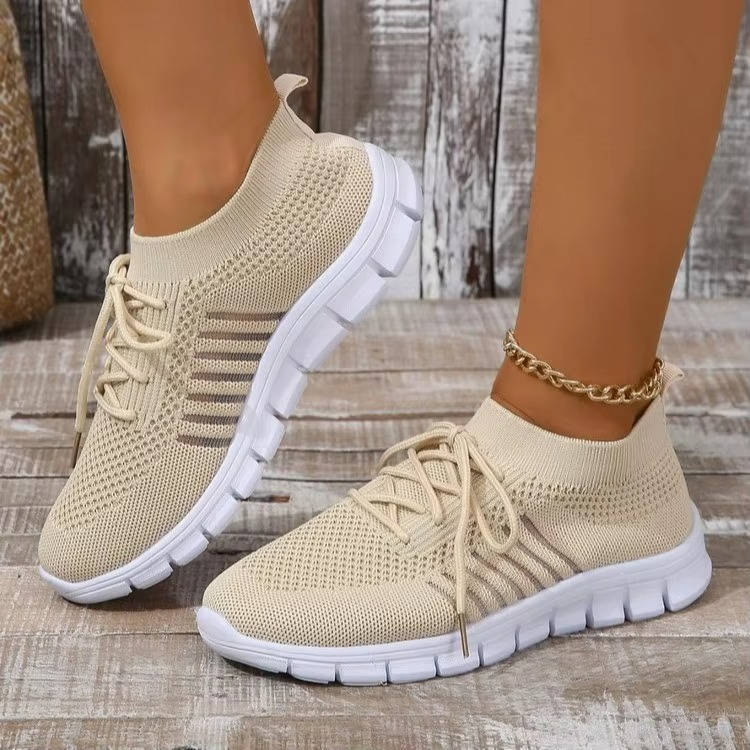 White breathable orthopedic nursing shoes with arch support and lightweight slip-on design