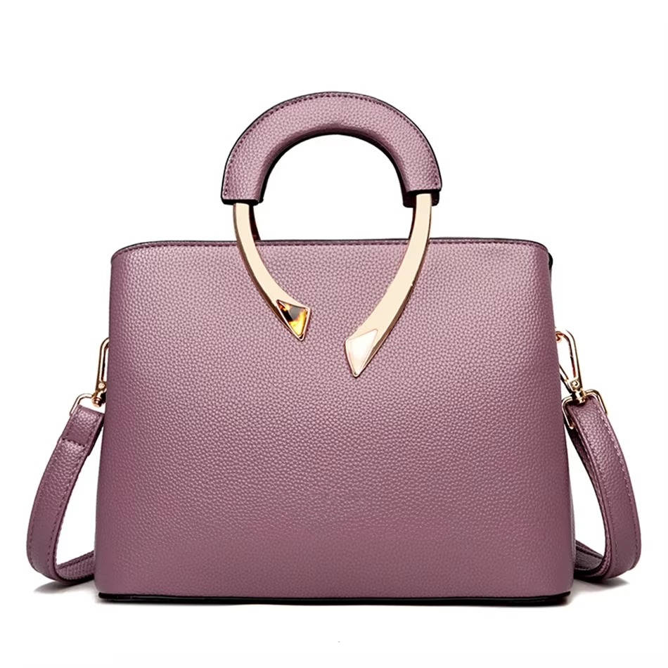 Structured pebbled faux leather handbag with gold metal handle, polished everyday professional tote