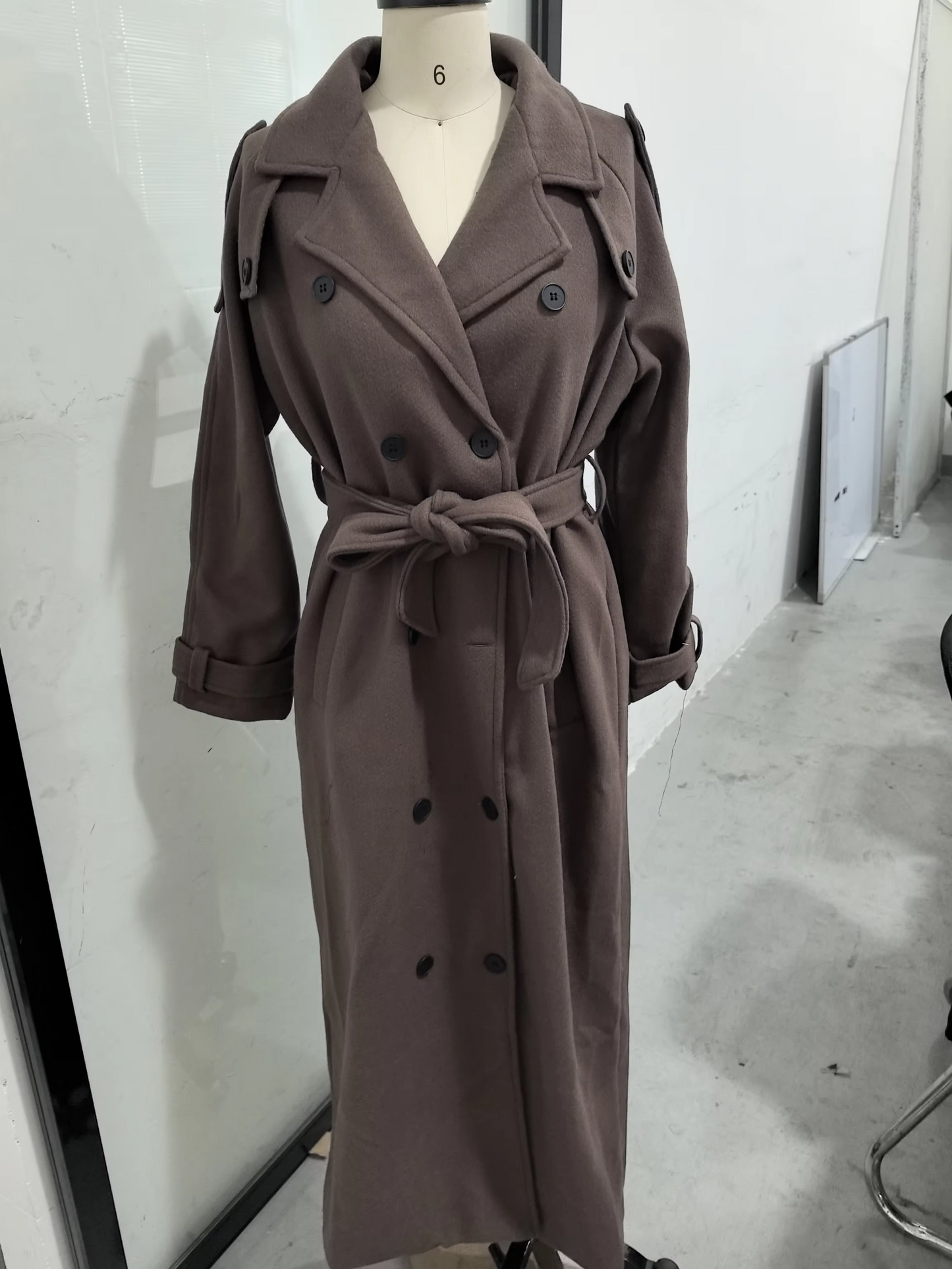 Women's grey wool overcoat double-breasted lace-up tailored silhouette warm polished winter style