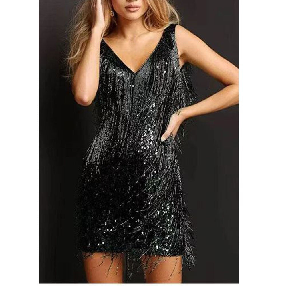 Women's black fringe mini party dress with V-neckline and beaded embellishments for dynamic movement