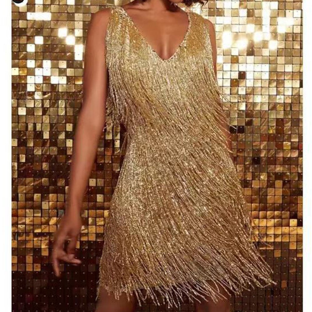 Women's black fringe mini party dress with V-neckline and beaded embellishments for dynamic movement