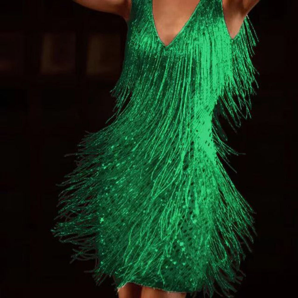 Women's black fringe mini party dress with V-neckline and beaded embellishments for dynamic movement