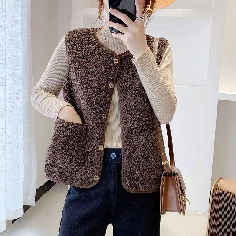 Women's cream sherpa vest cozy V-neck layering piece with plush fluffy fabric for everyday warmth