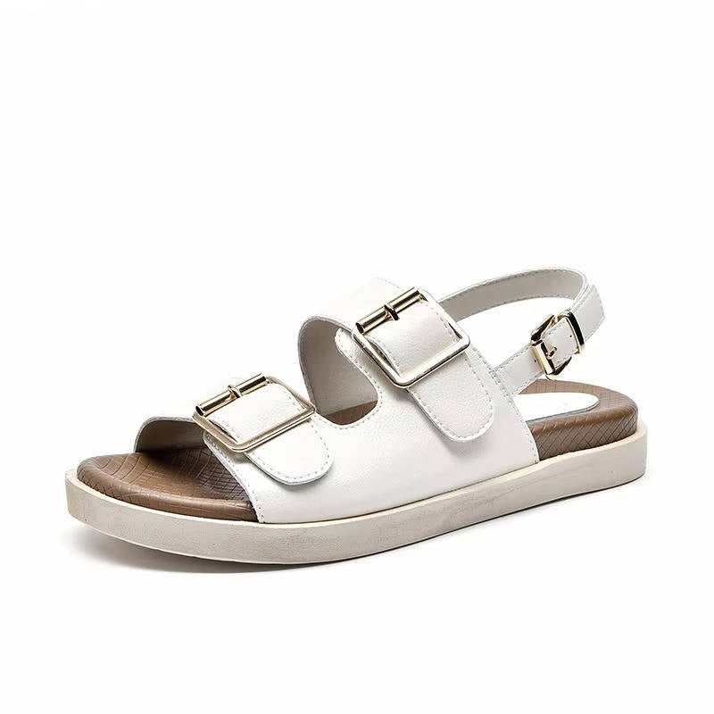 Women's brown leather platform gladiator sandals with buckle straps and handcrafted open-toe silhouette