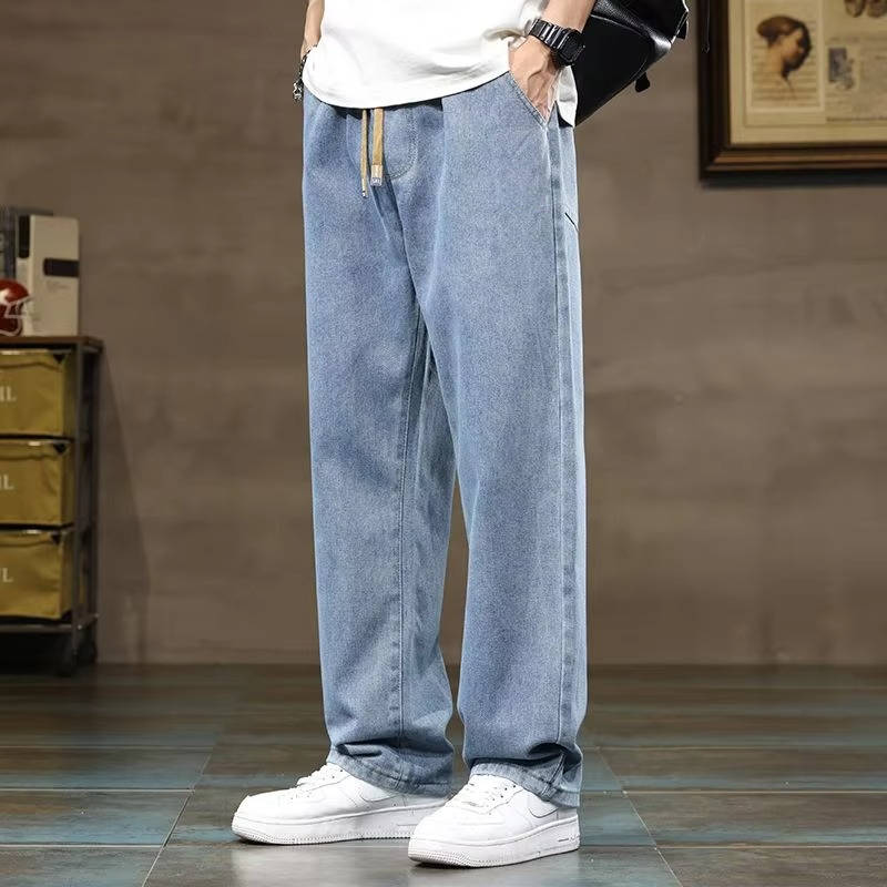 Men's blue relaxed fit drawstring denim jeans with soft polyester-viscose blend for everyday wear
