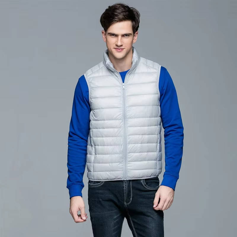 Men's navy blue lightweight packable down vest slim fit insulated travel-ready outerwear