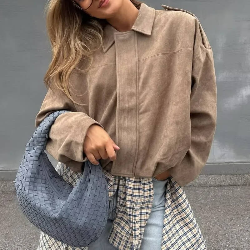 Women's cropped suede bomber jacket with collar, waist-length cut for effortless day-to-night style