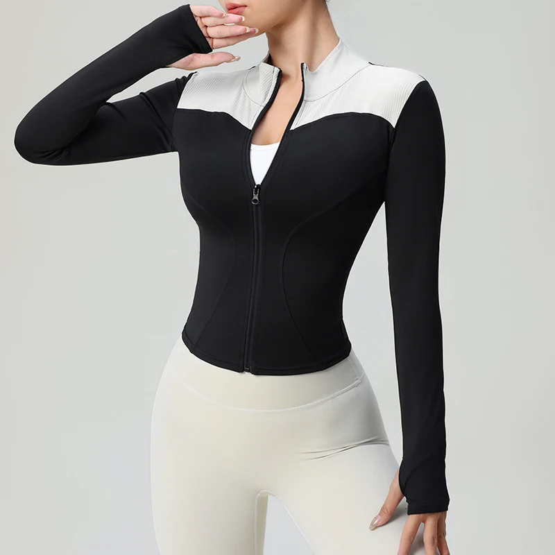 Black slim-fit full-zip activewear jacket with contouring panels for moisture-wicking athletic performance