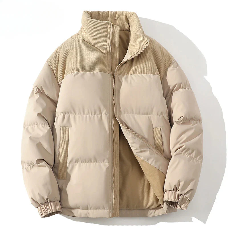 Men's hip-length premium puffer jacket with quilted insulation and textured corduroy yoke detail