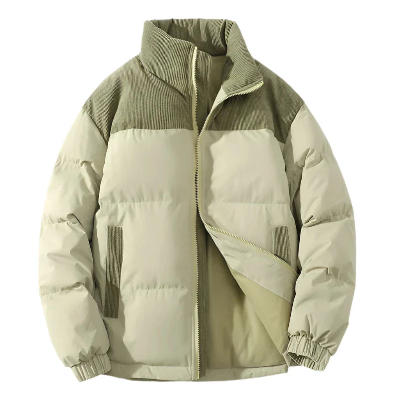 Men's hip-length premium puffer jacket with quilted insulation and textured corduroy yoke panel