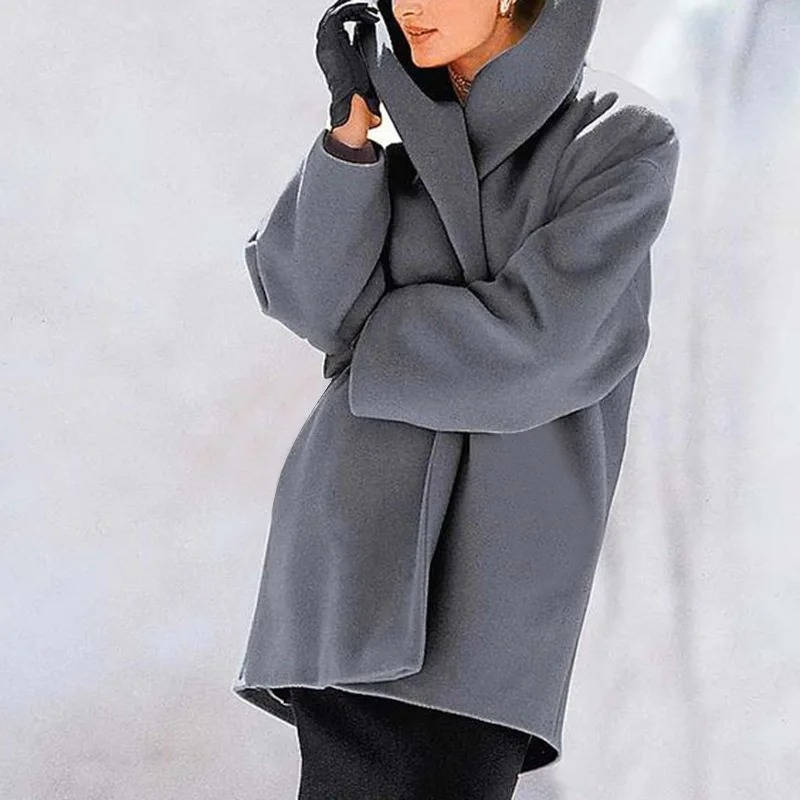 Women's wool blend cocoon coat in neutral tone, relaxed oversized silhouette with polished structured drape