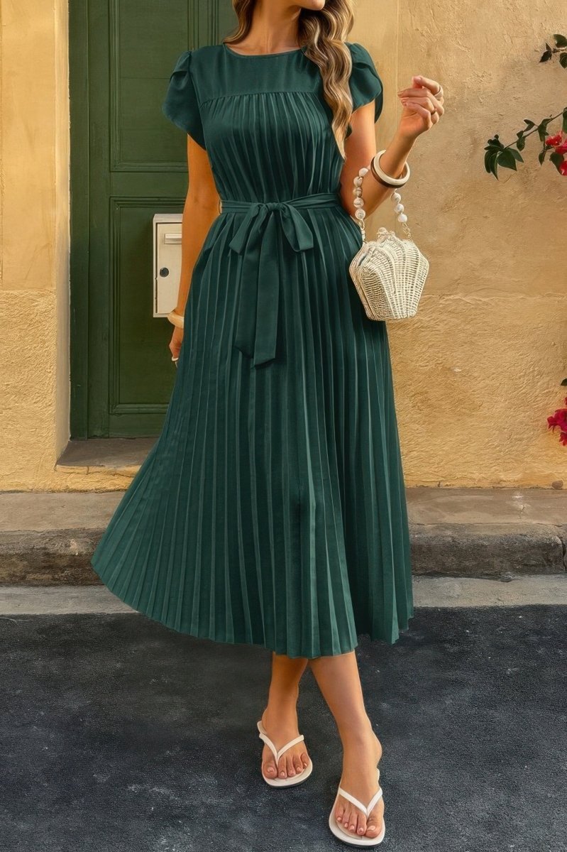 White pleated midi dress with puff sleeves and self-tie waist belt, elegant spring silhouette