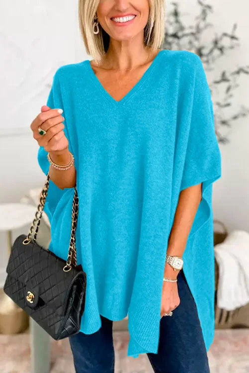 Women's soft knit poncho top loose fit V-neck draped layer in neutral tones for fall winter