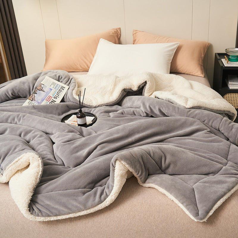 Reversible sherpa flannel throw blanket in neutral tones with dual-texture cozy design for home lounging