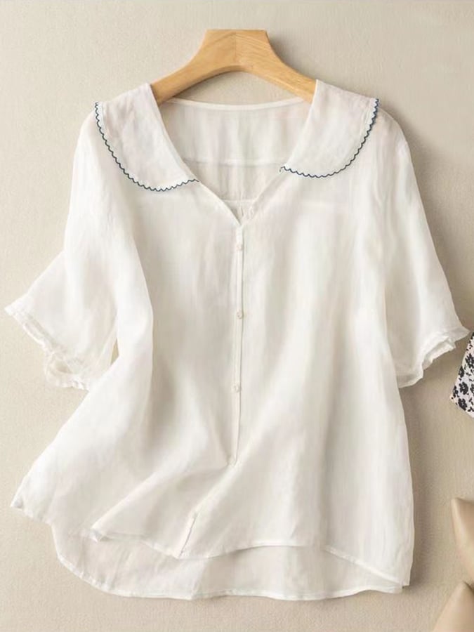 Women white button-down blouse relaxed fit short sleeves ruffled collar elegant workwear smart casual