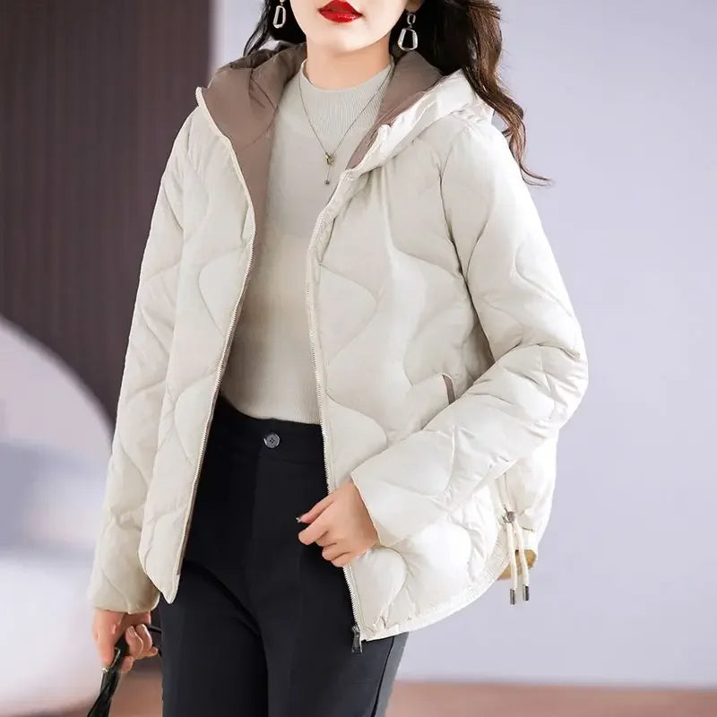 Black quilted puffer jacket sleek texture lightweight insulation everyday outdoor cold-weather style