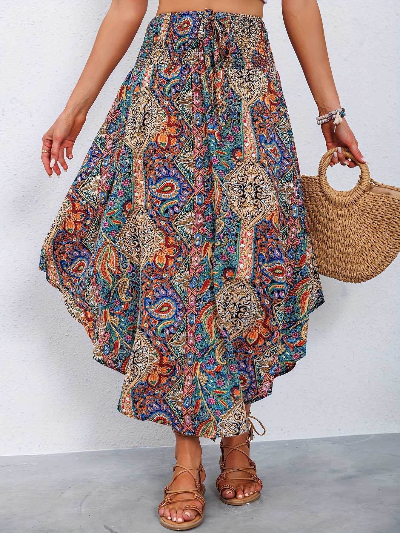 Women's bohemian paisley maxi skirt with elastic waist and asymmetric flowing hem