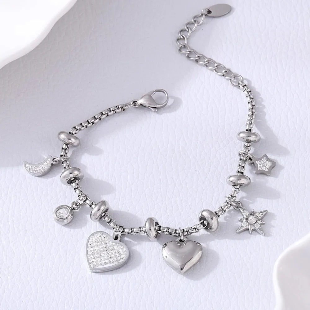 Adjustable charm bracelet with zircon accents, non-tarnish stainless steel, elegant love-themed design