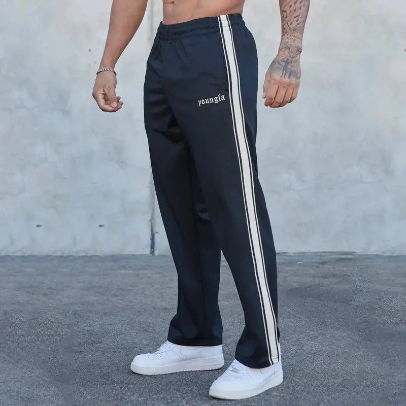 Black urban sweatpants bold side stripe elastic waistband soft premium fabric relaxed fit