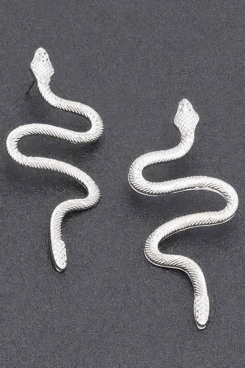 Bold lightweight sculptural snake statement earrings with detailed snake head design for editorial glam