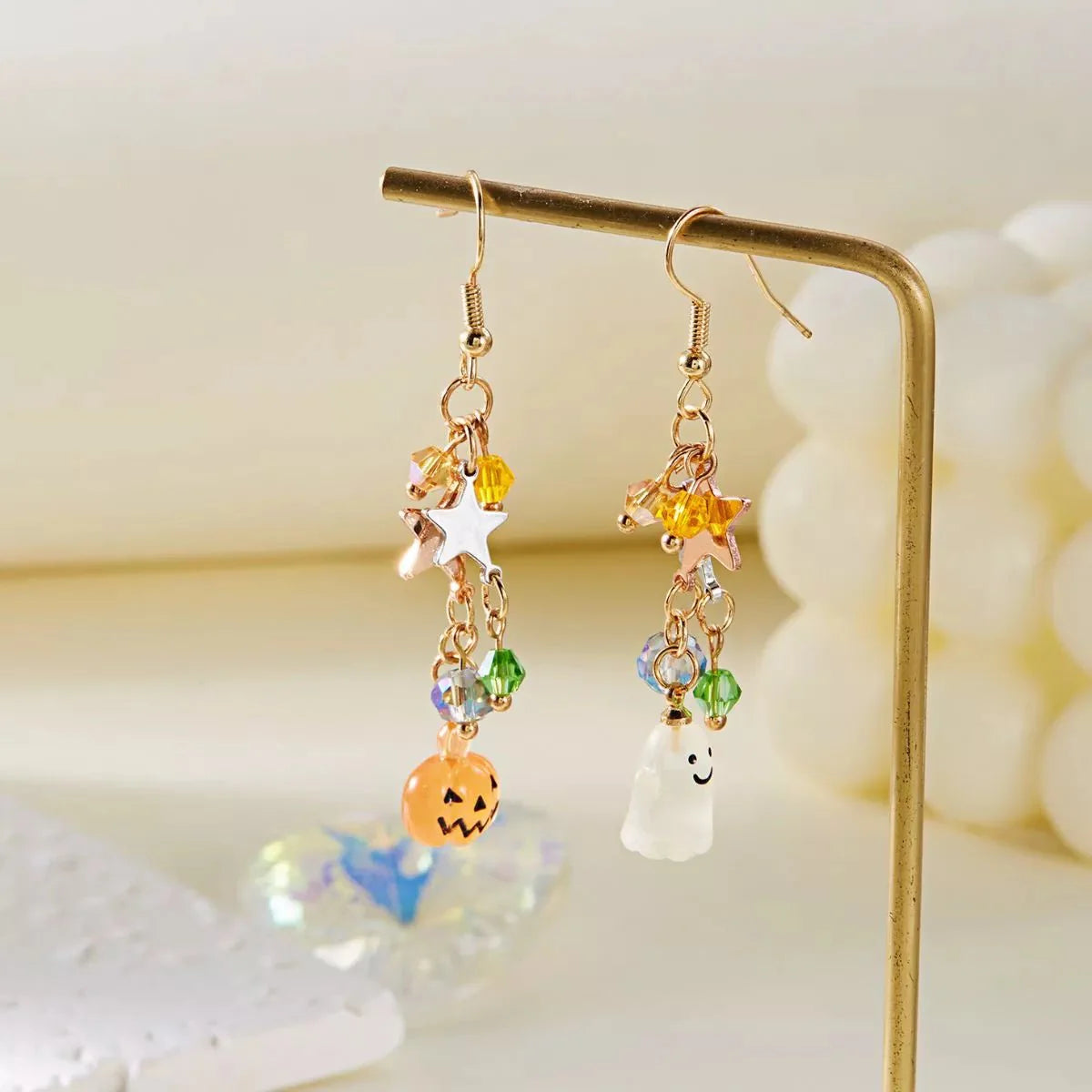 Asymmetrical Halloween earrings pumpkin ghost design 18K gold plated with star bead accents