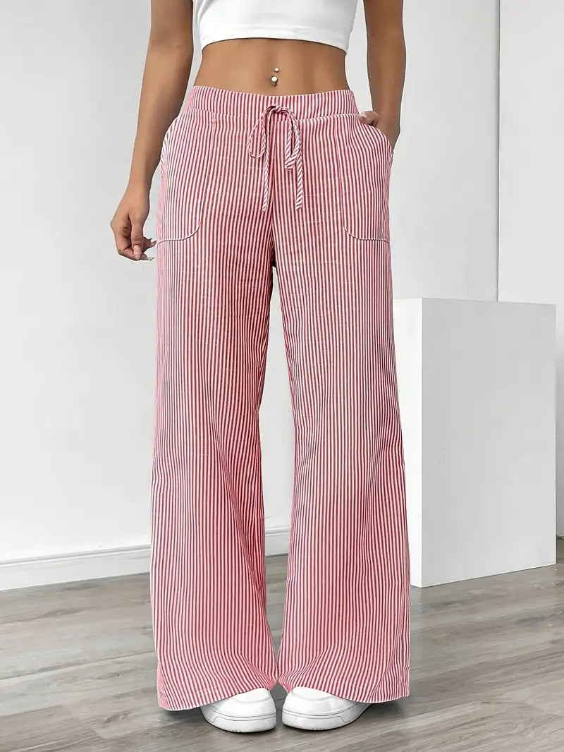 White and black striped wide-leg trousers with relaxed fit and elasticated drawstring waistband