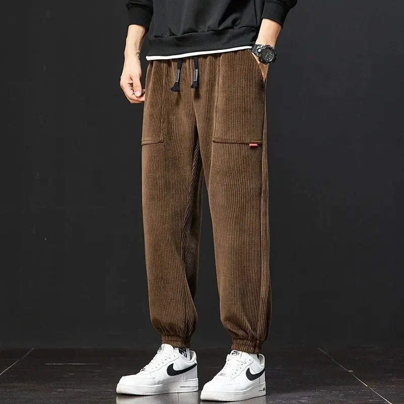 Beige corduroy sweatpants relaxed fit lounge style with adjustable waistband and deep pockets