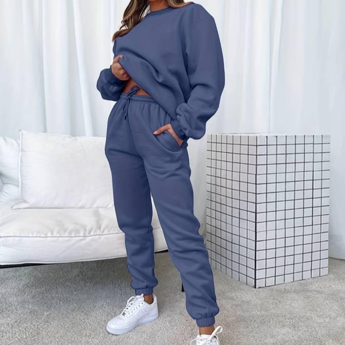 Women's matching gray sweatshirt and jogger lounge set with relaxed minimalist silhouette