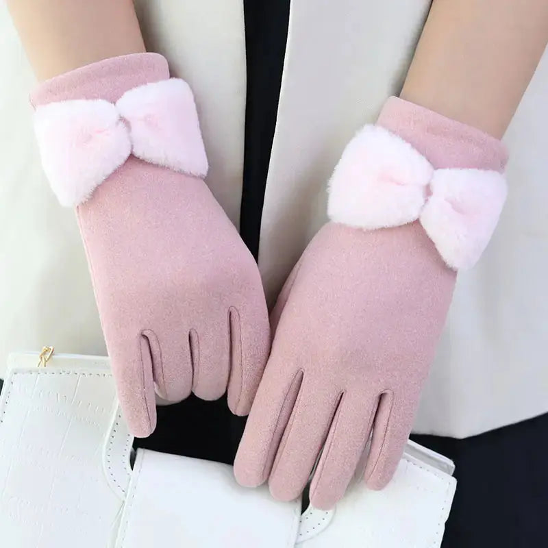 Women's black fleece-lined windproof winter gloves with touchscreen fingertips and bow detail