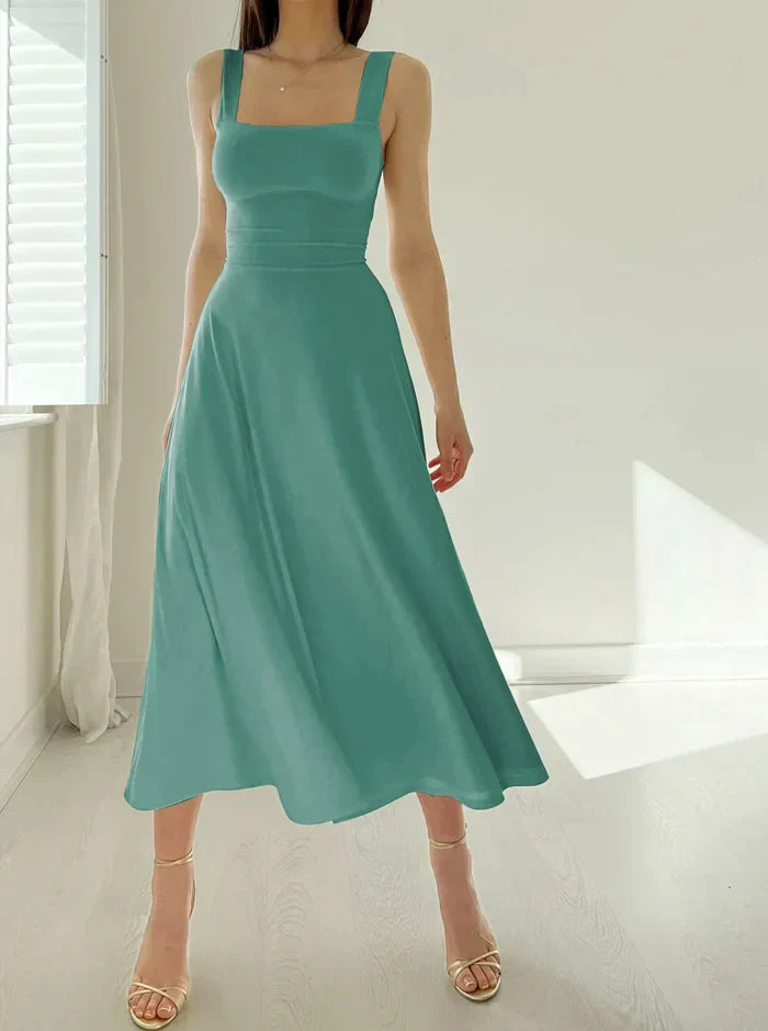 Women's silk-like Polly dress flattering silhouette breathable fabric elegant curve-accentuating design